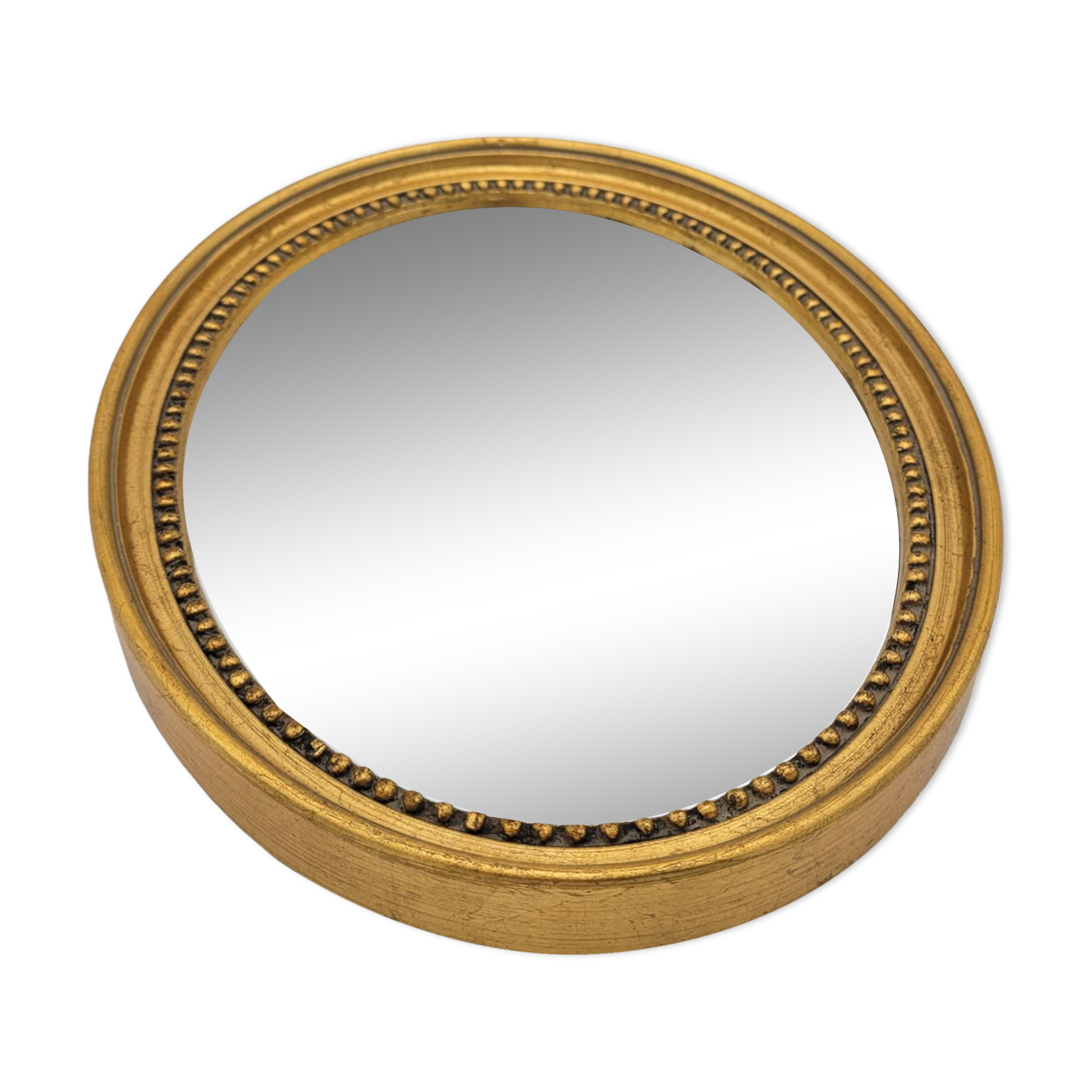 Small old oval mirror in gilded wood