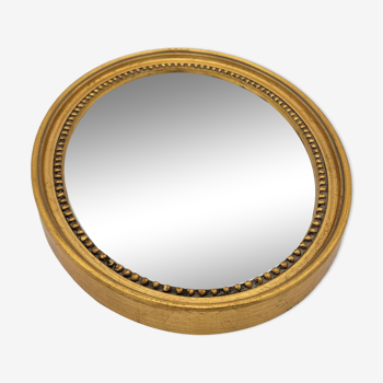 Petit miroir ovale ancien en bois doré