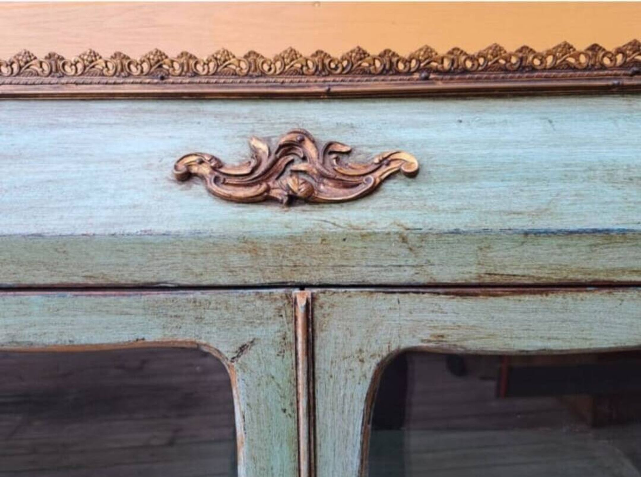 Blue patinated wooden display cabinet