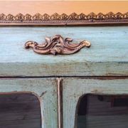 Blue patinated wooden display cabinet