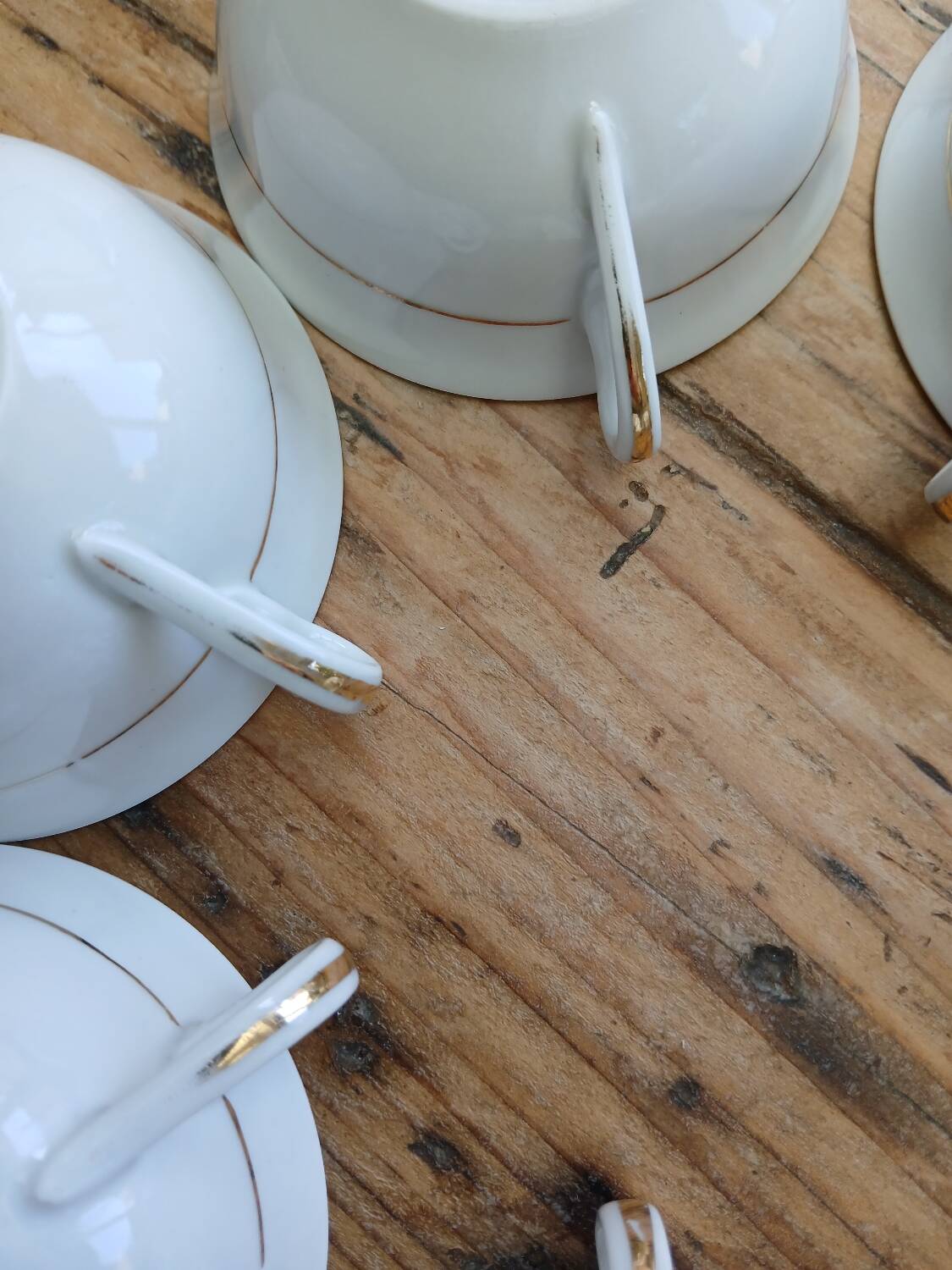 Set of 7 Limoges porcelain cups and saucers