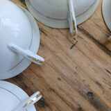 Set of 7 Limoges porcelain cups and saucers