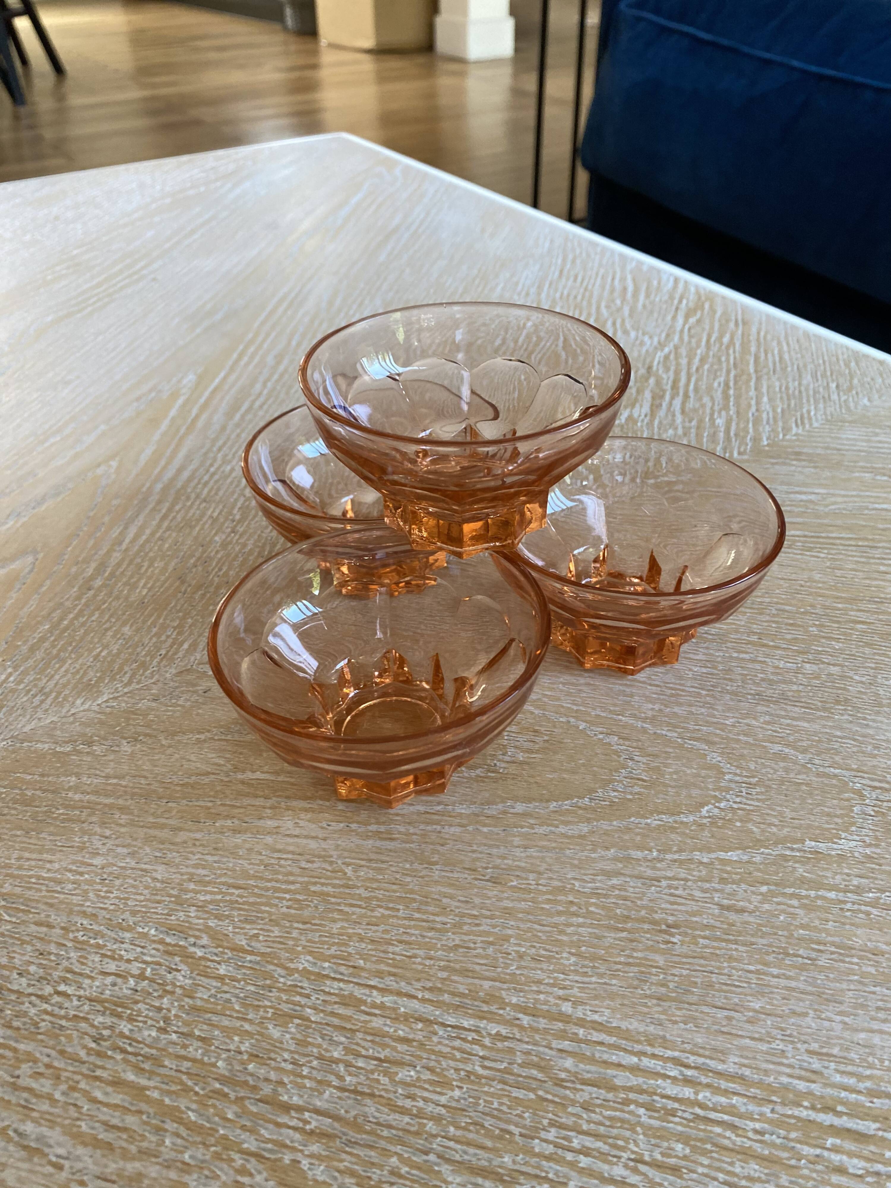 4 Glasses / Cups in translucent pink glass