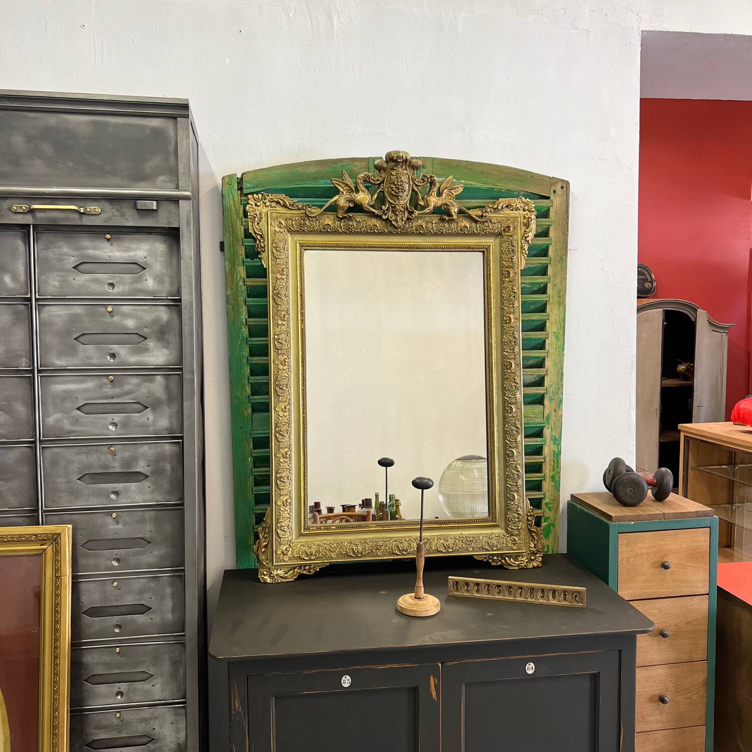 Old Napoleon III mirror decorated with a griffin