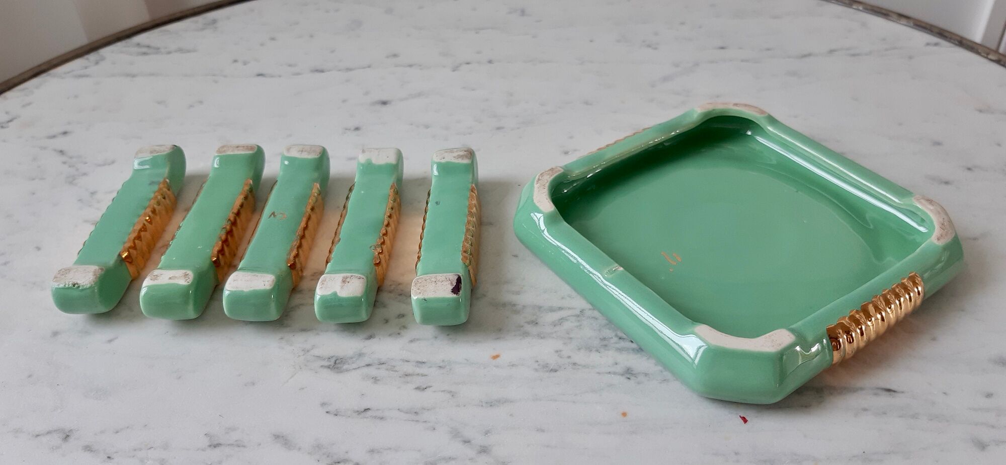 Set of a bottle bottom and 5 knife holders in art deco mint green ceramic