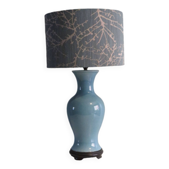 Vintage ceramic table lamp with custom-made lampshade.