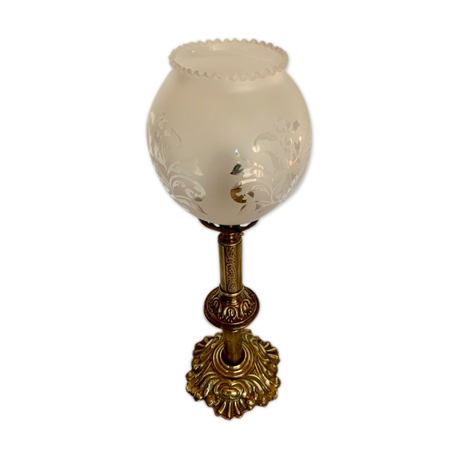 Ancient lamp on foot