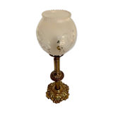 Ancient lamp on foot