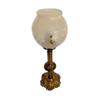 Ancient lamp on foot