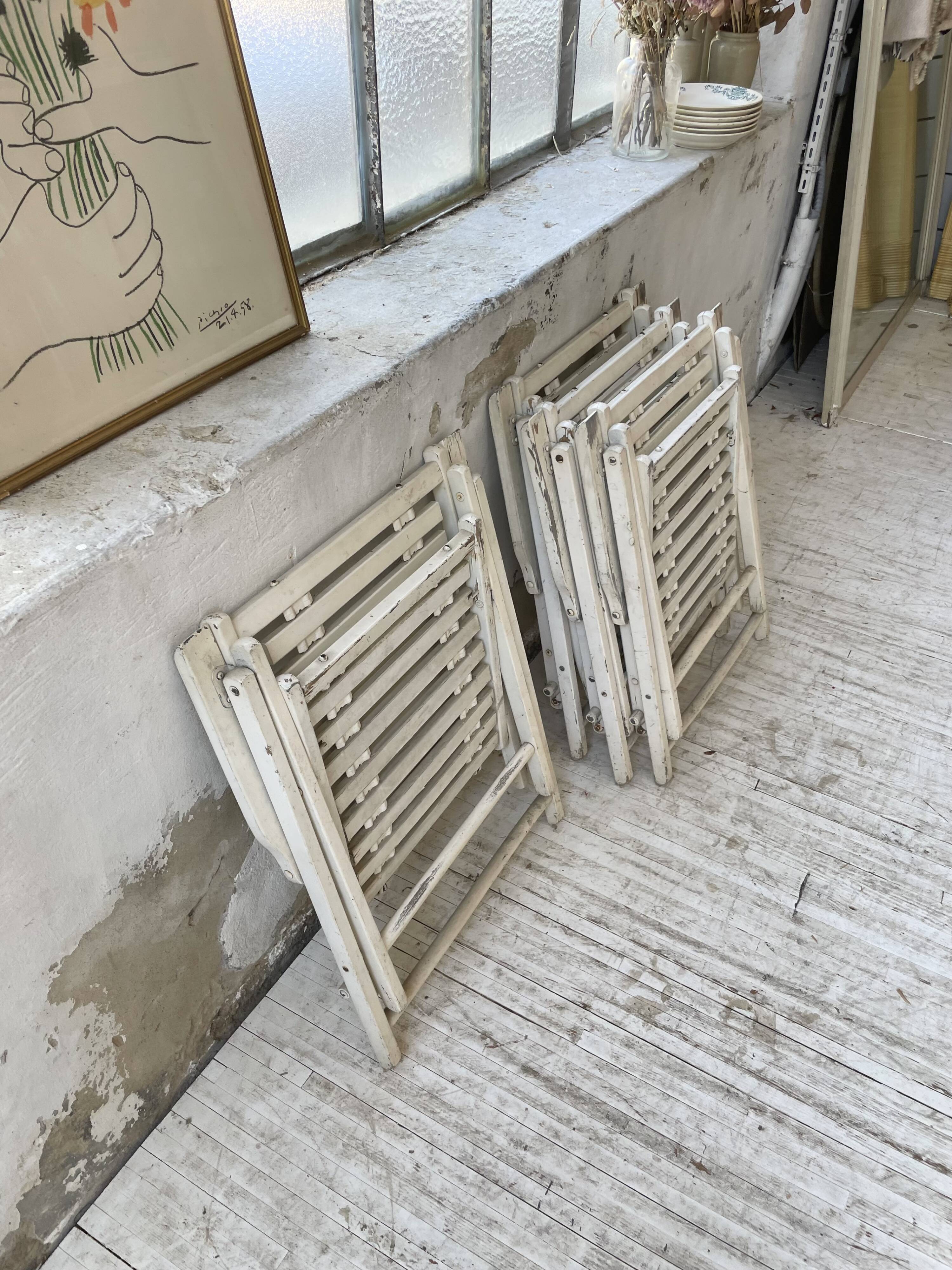 4 white wooden garden chairs