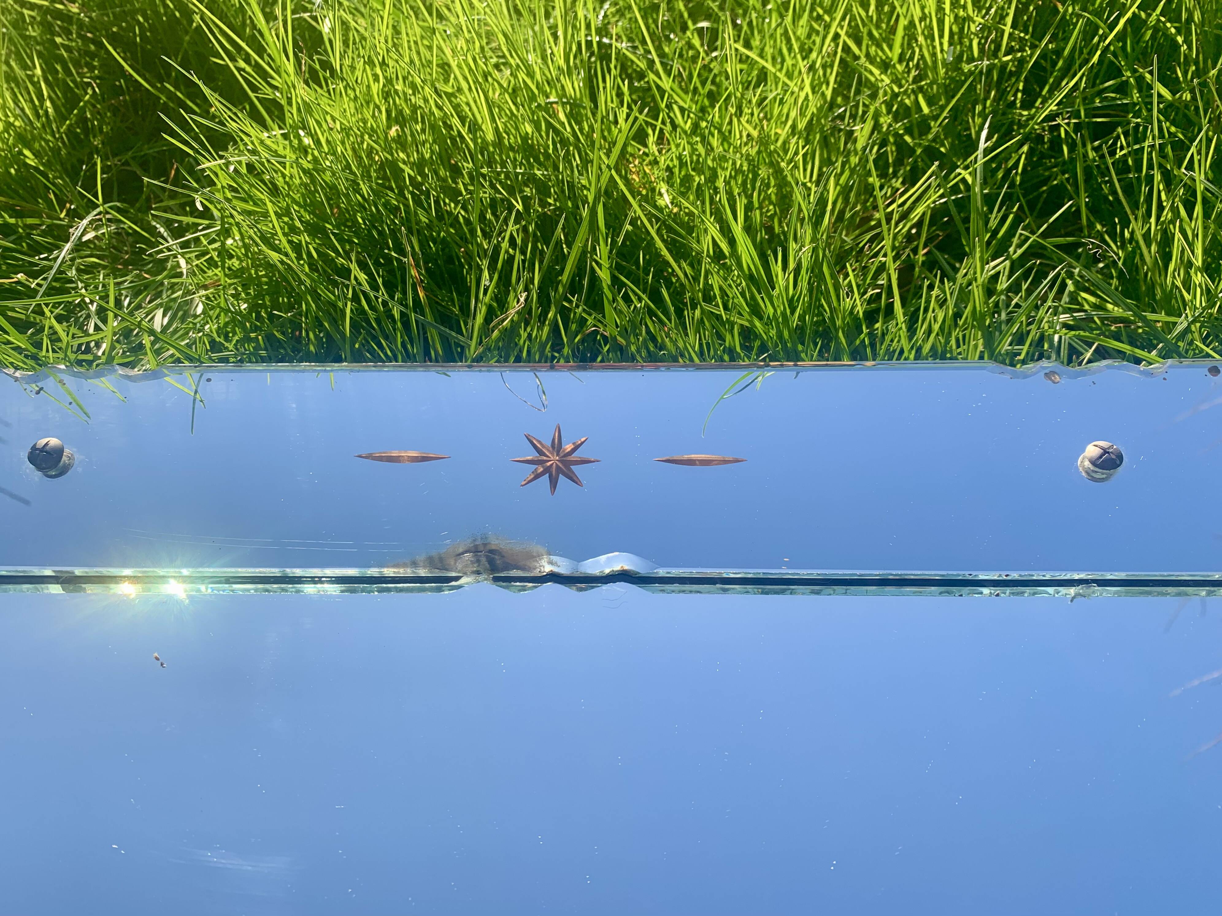 Rectangular Art Deco wall mirror inlaid and chiseled on wood