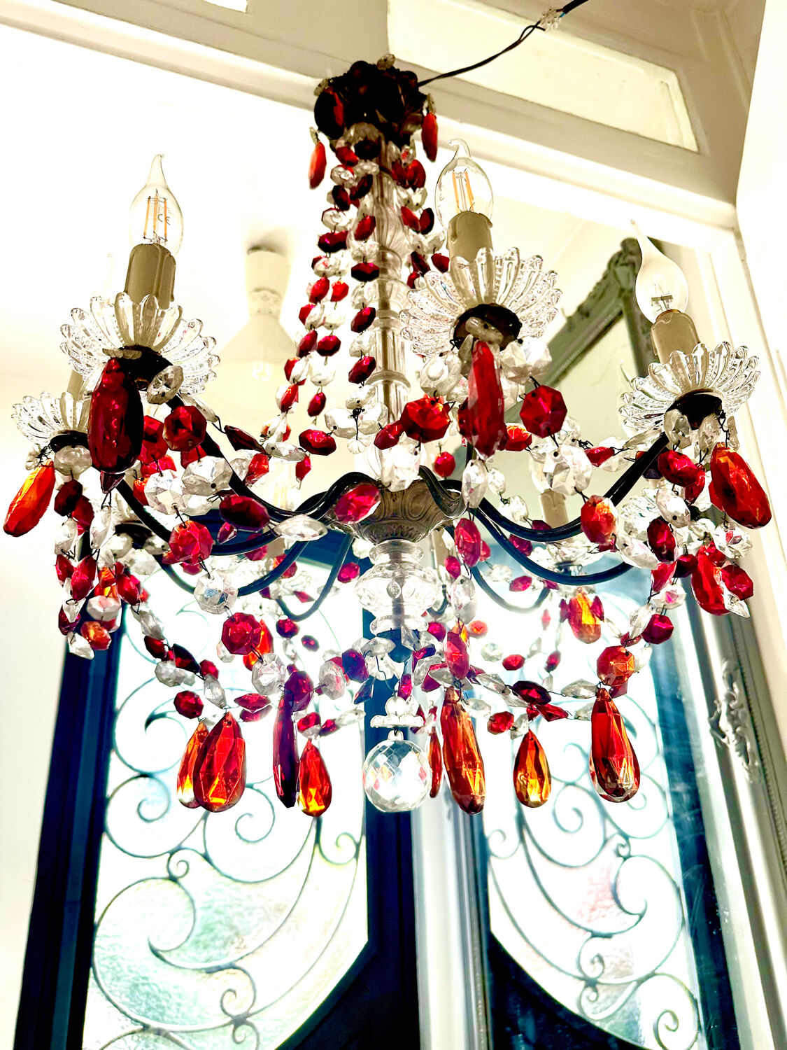 Antique chandelier with red crystal pendants, 9 lights.