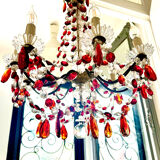 Antique chandelier with red crystal pendants, 9 lights.