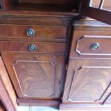 Scribanne bookcase in mahogany veneer English work of the twentieth century