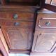 Scribanne bookcase in mahogany veneer English work of the twentieth century