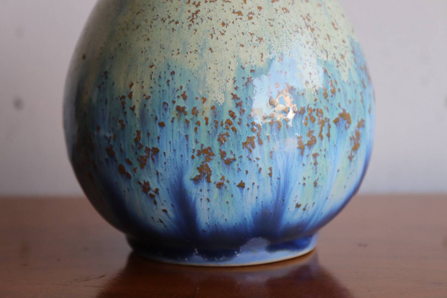 Small vase in glazed blue stoneware.