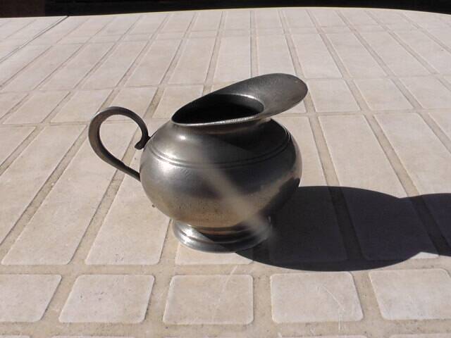 Fine pewter milk jug
