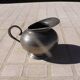 Fine pewter milk jug