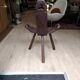 Rustic wooden tripod chair