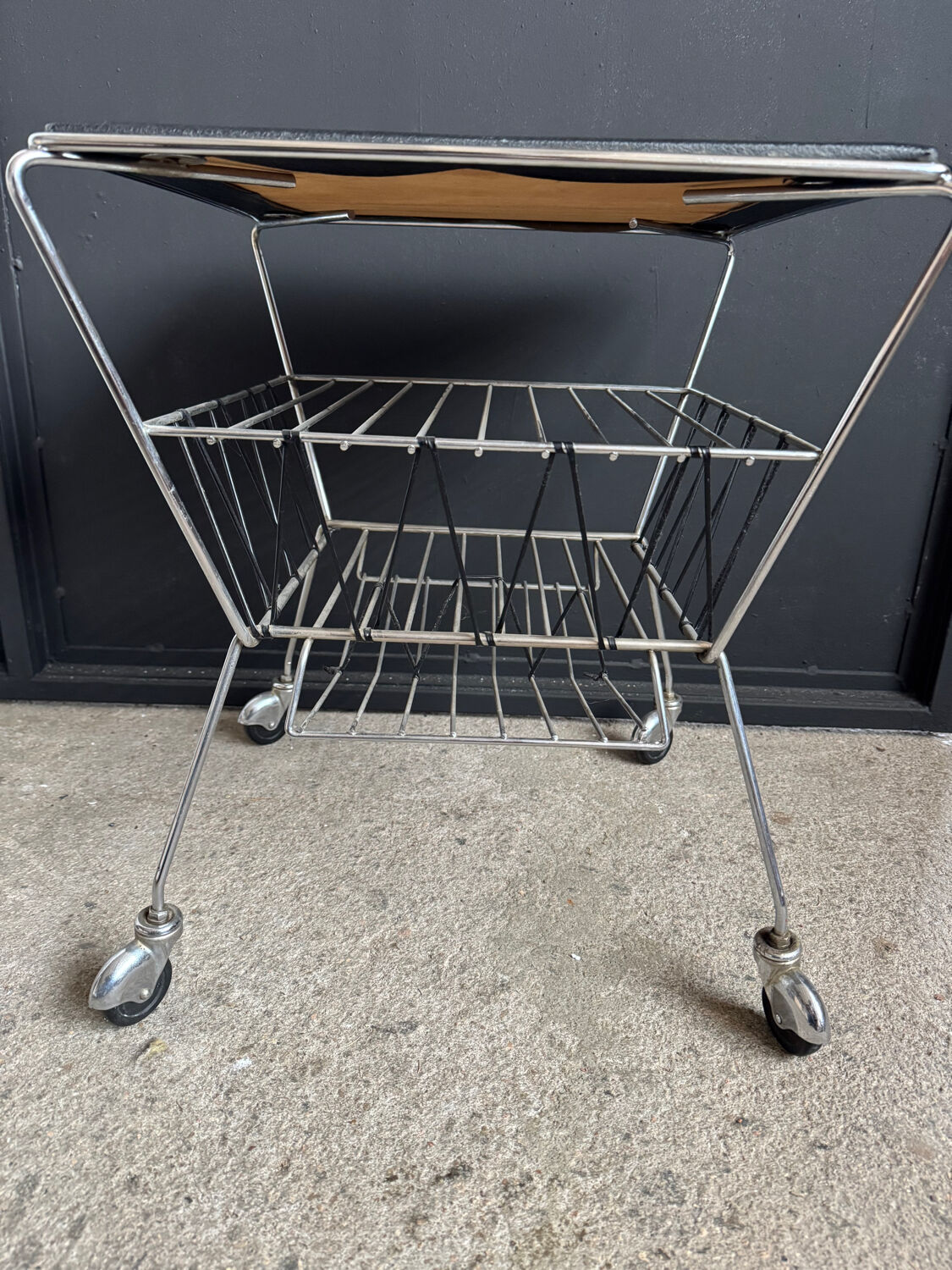 1950s rolling magazine rack