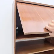 Scandinavian style bookshelf in teak and brass, 1950.