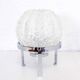 Glass table lamp on a silver base