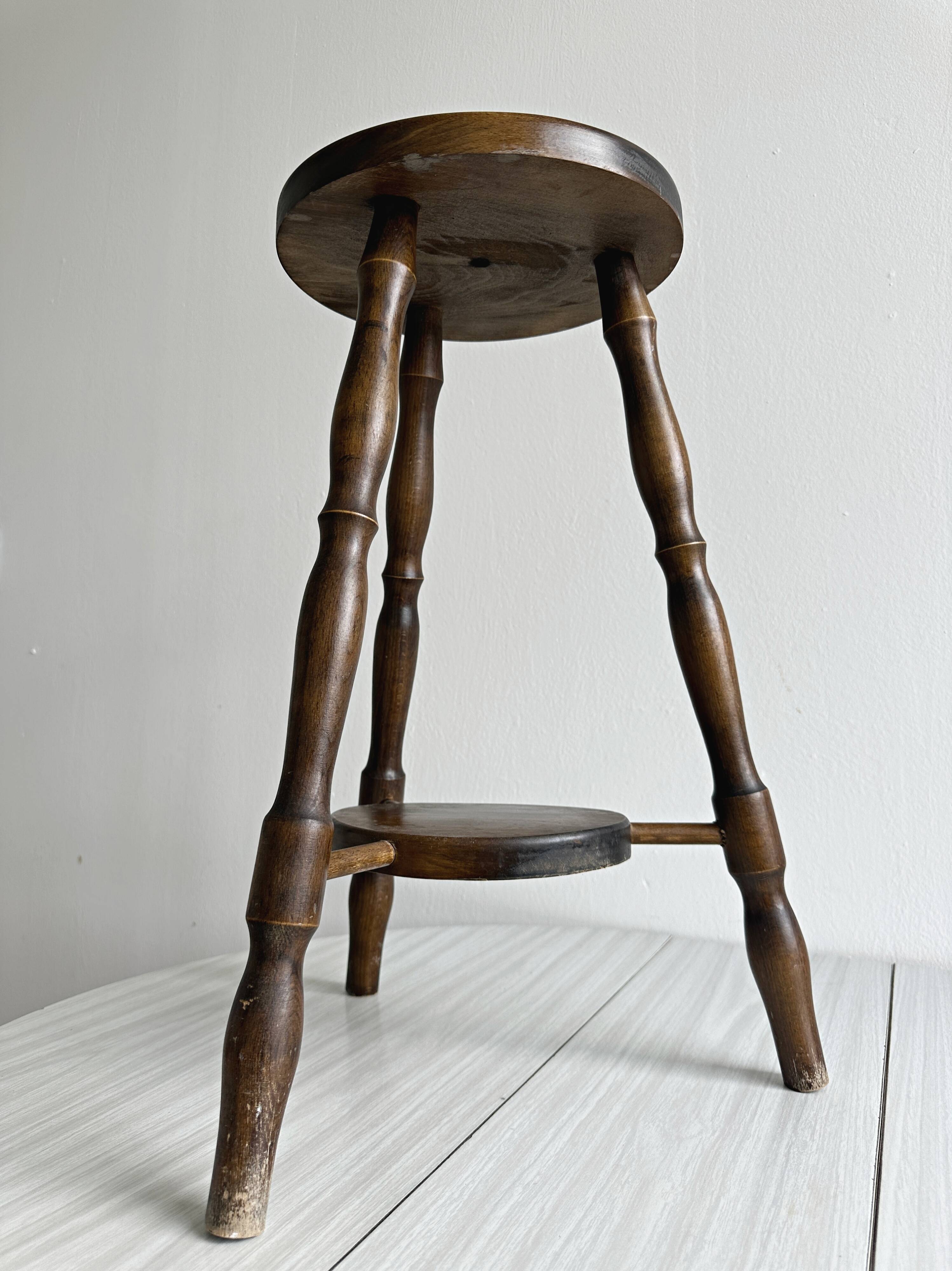 Antique dark wood stool