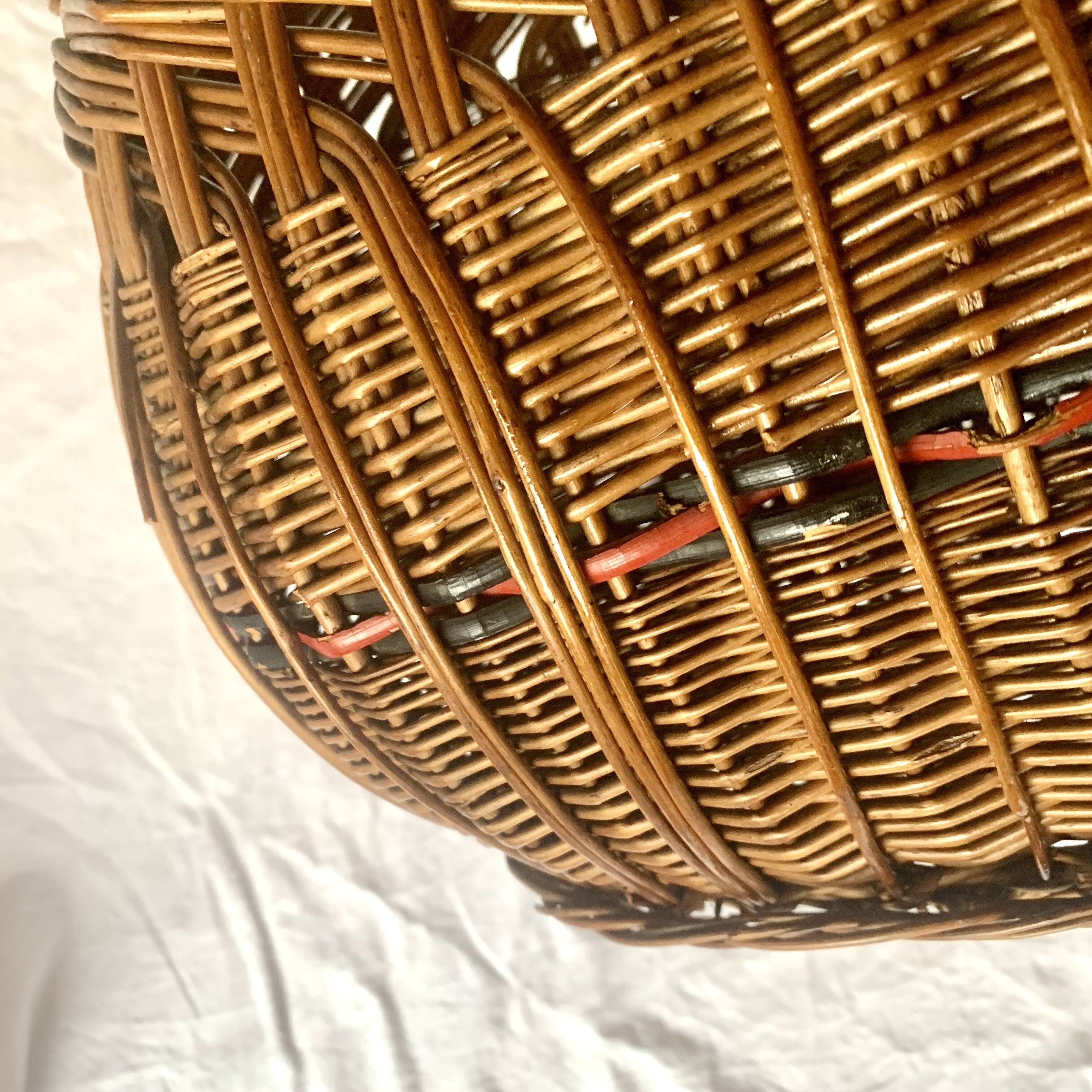 Old woven wicker basket and scoubidou