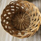 Vintage round wicker basket on stand