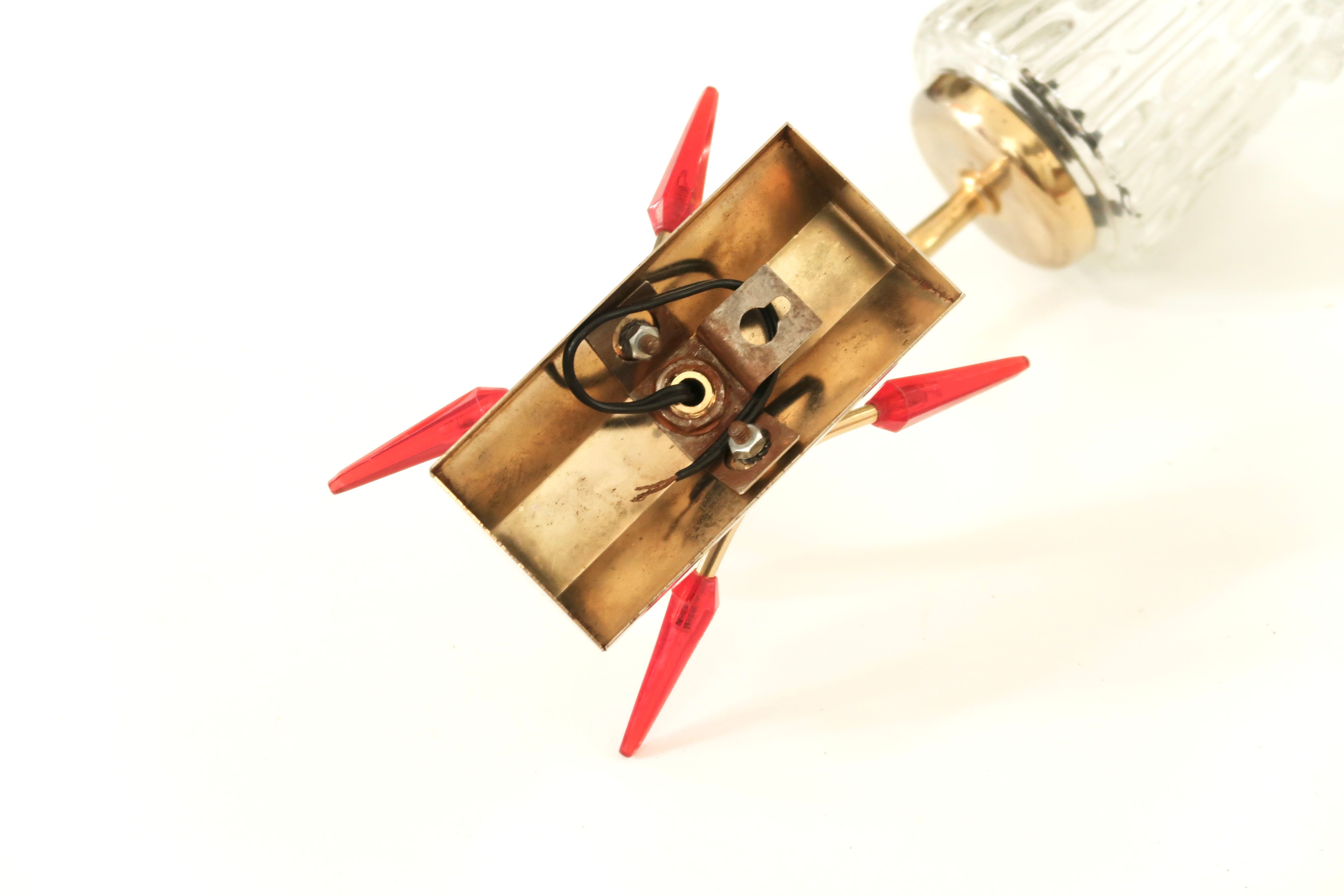 Pair of gold metal and glass sconces, 50s