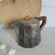 Old silver and wood teapot
