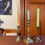 Trio of brass candlesticks