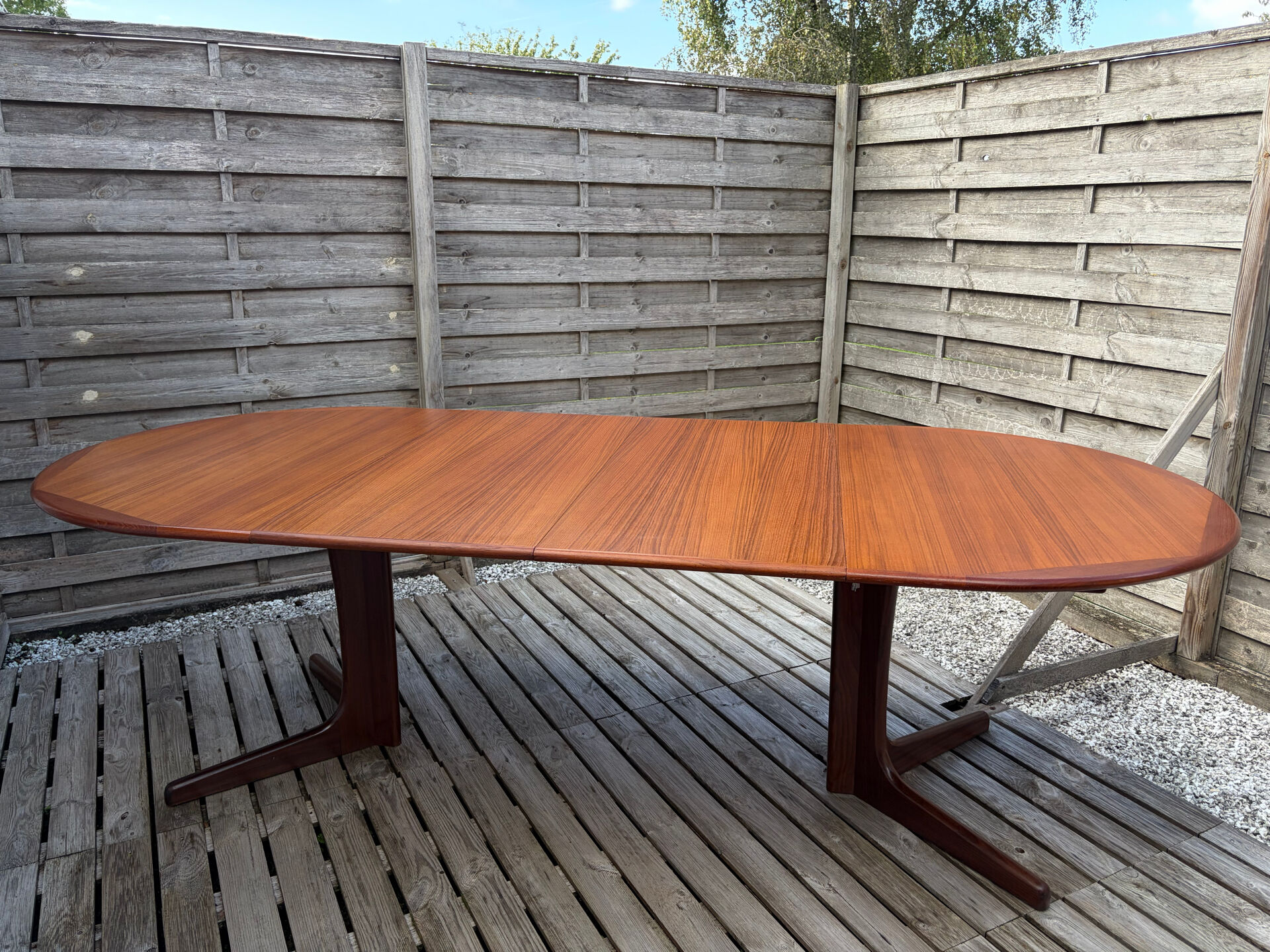 Oval teak table extendable with two leaves, Baumann style.