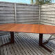 Oval teak table extendable with two leaves, Baumann style.