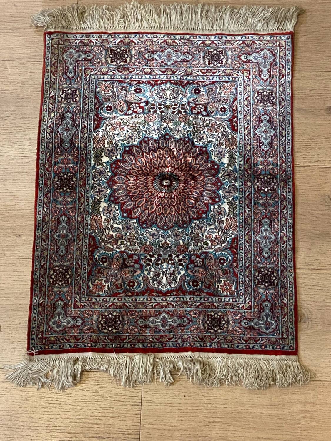Handmade Persian silk carpet