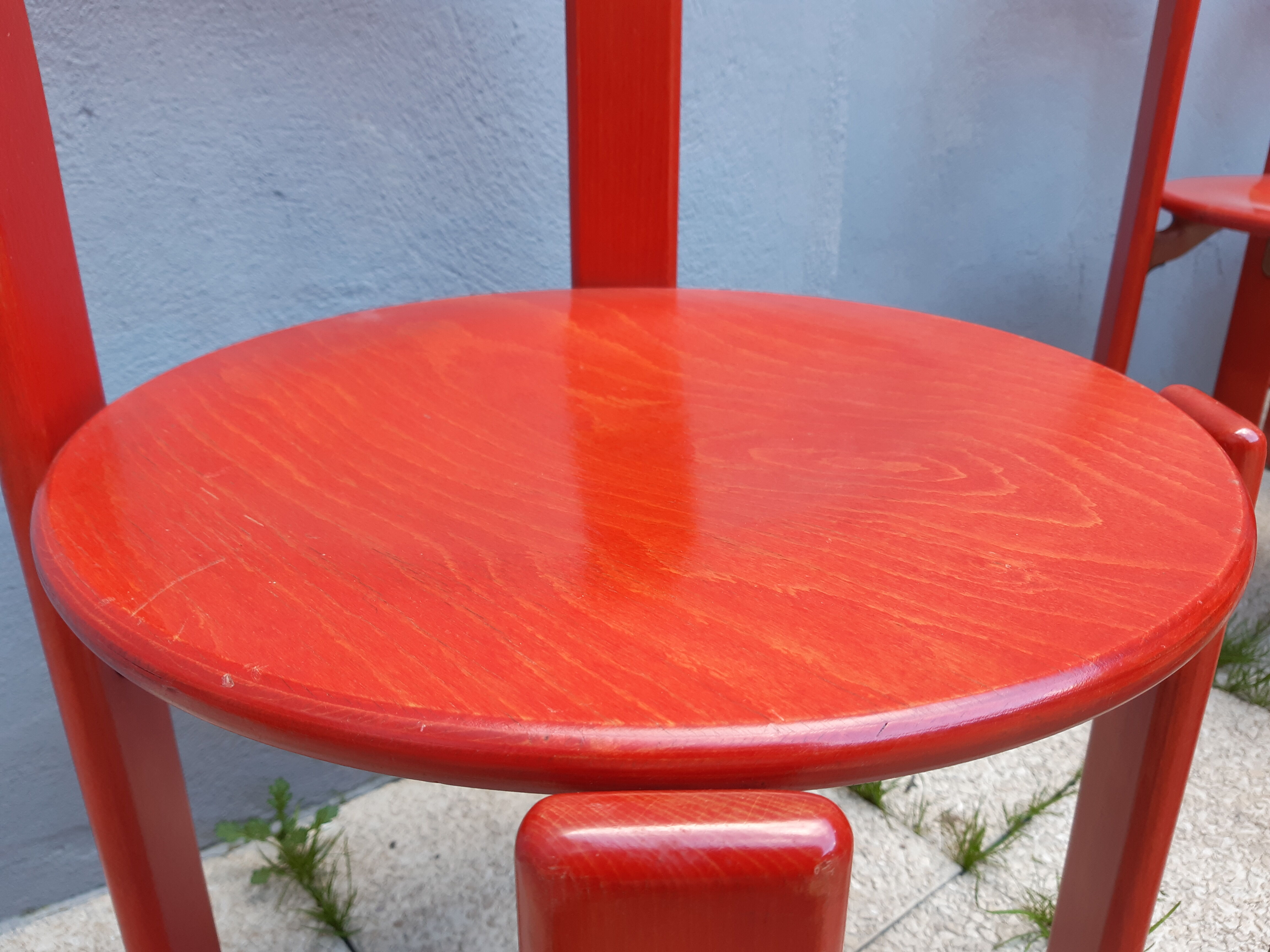 Set of 10 red wooden chairs by Bruno Rey for Kusch&Co