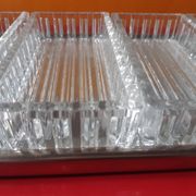 Service platter for aperitifs with four compartments in cut glass.