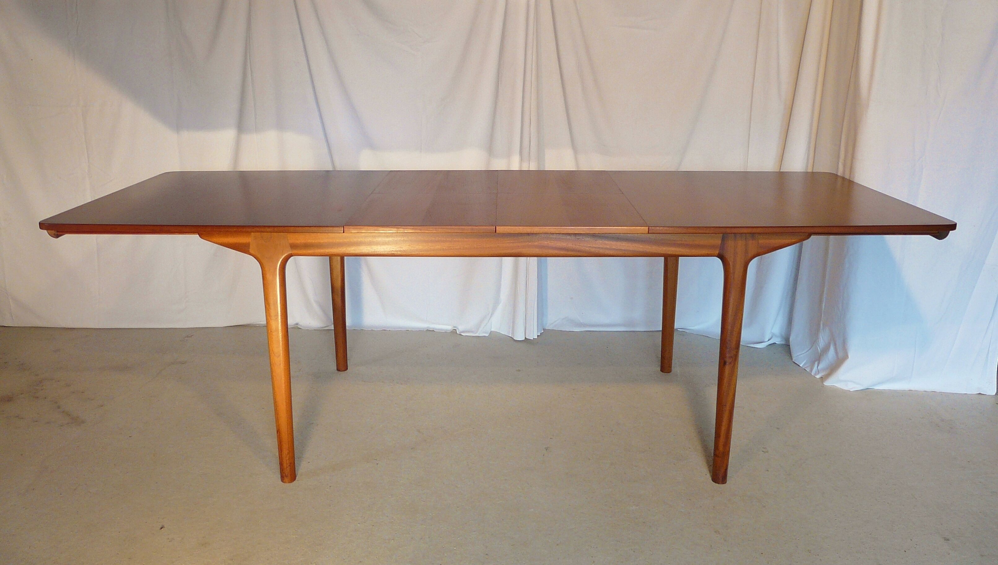 Extendable table set and six Scandinavian Teak Mc Intosh chairs