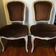 A pair of Louis XV style armchairs in wood and velvet fabrics