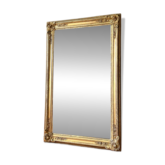 Antique gilded mirror from the early 19th century.