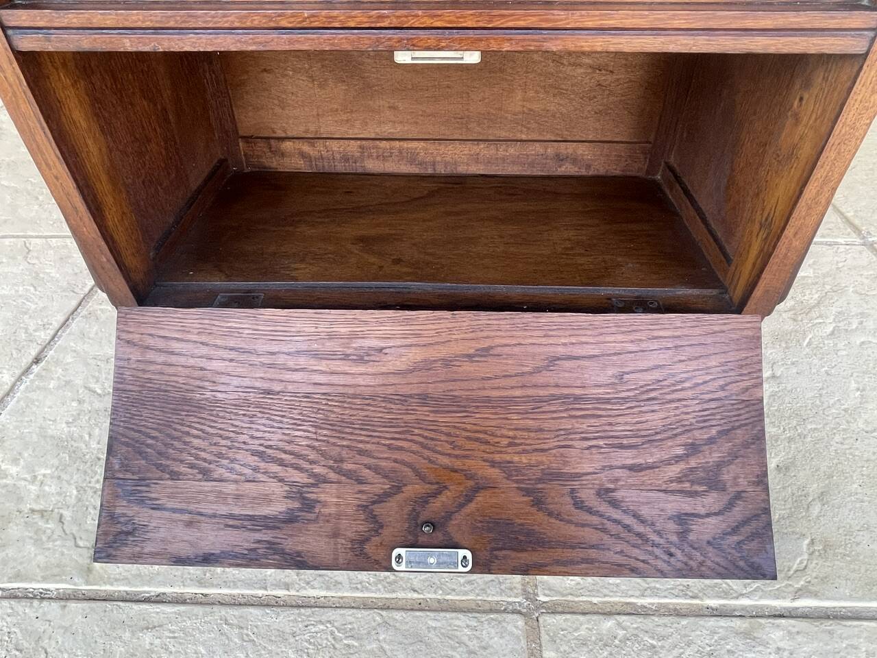 Art Deco bedside table in walnut, black marble top, circa 1920.