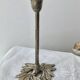 Pair of metal flower candlesticks