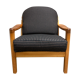 Fauteuil noir 1960 avec son estampille scandinave.