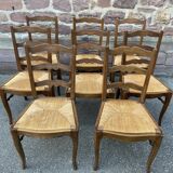 8 vintage rustic mulched chairs