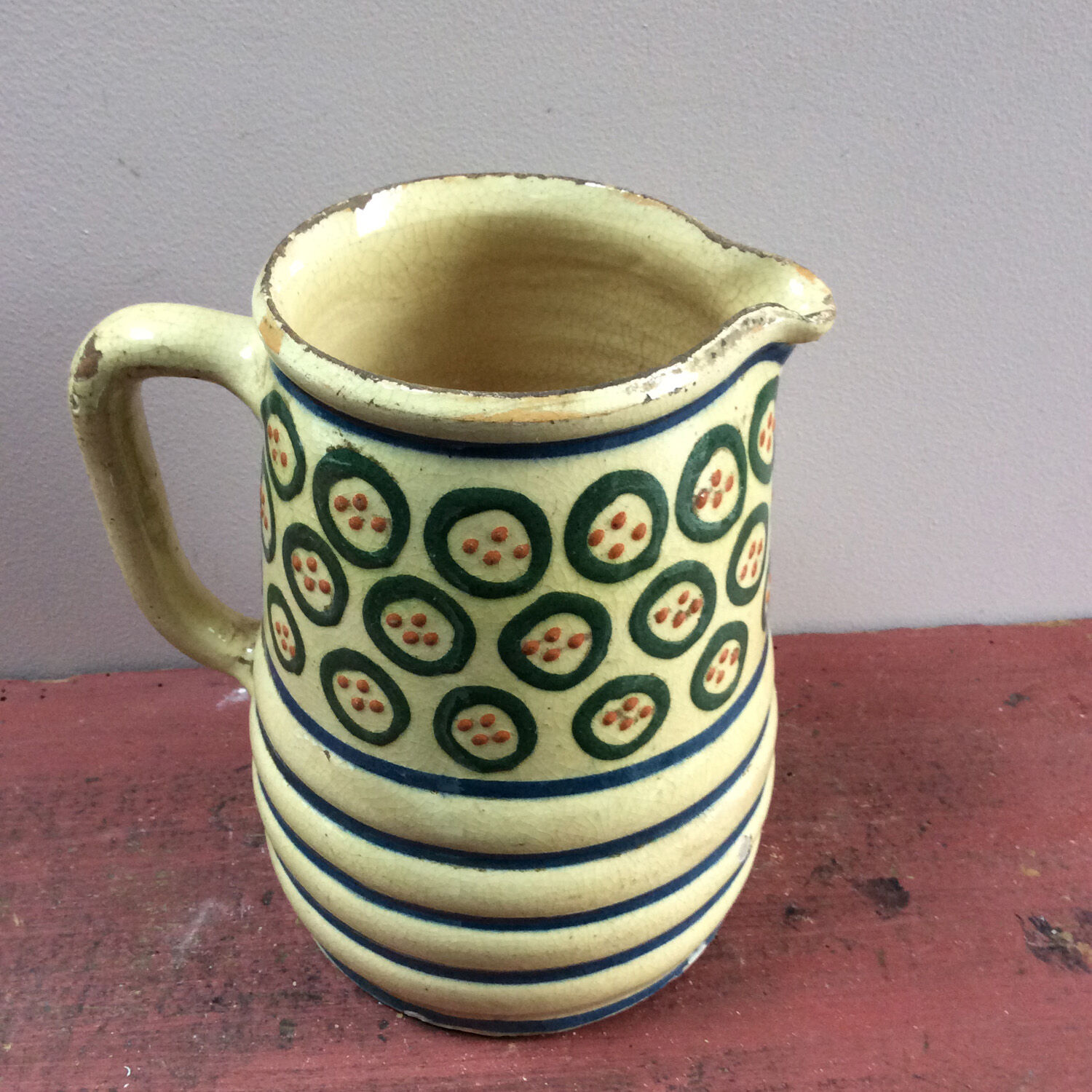 Glazed pottery pitcher