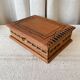 Carved wooden box with key