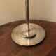 Silver-plated metal candlestick in vintage Art Deco style