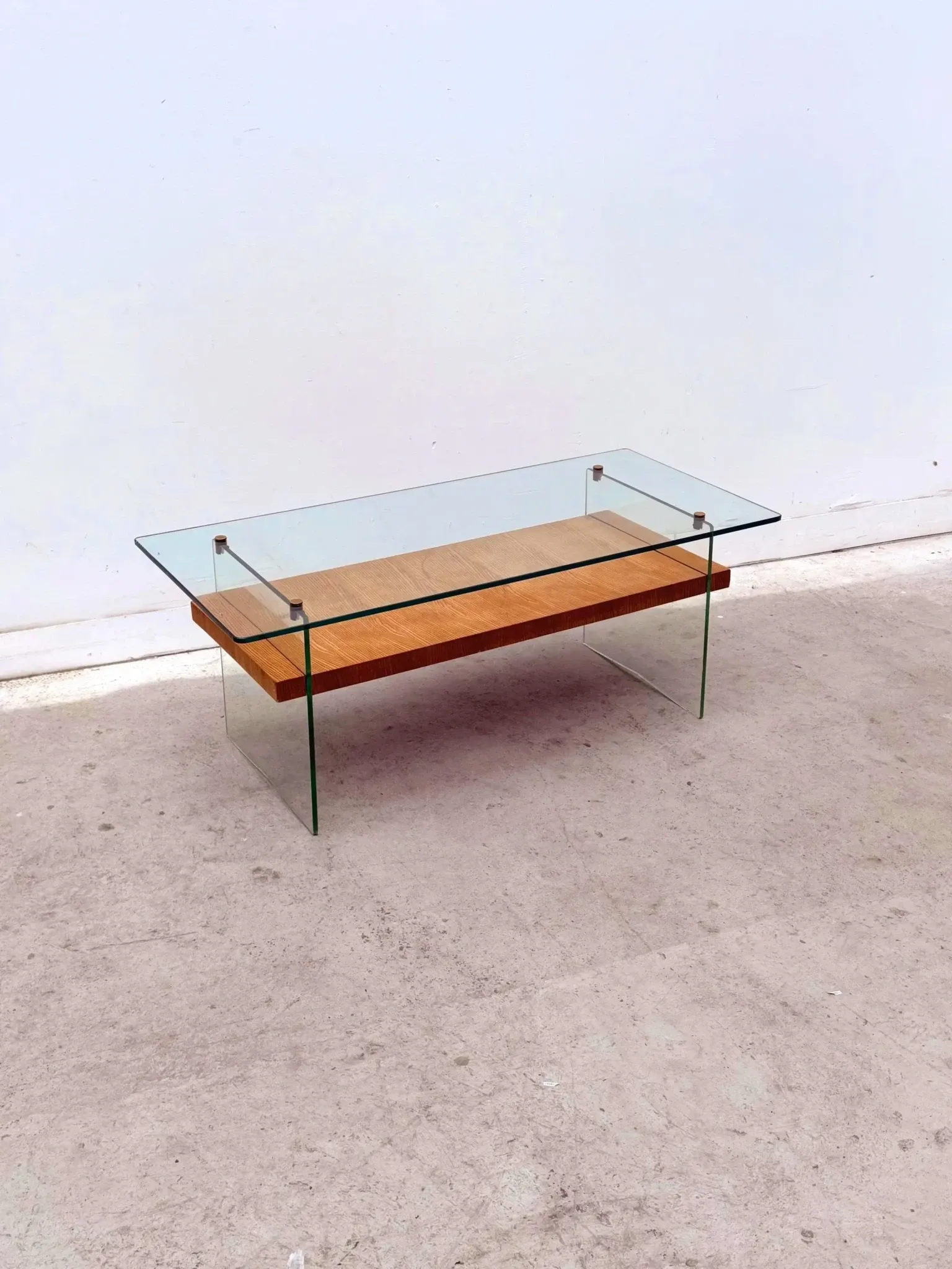 Coffee table by Robert Debiève in ash veneer, glass and brass, France 1950.