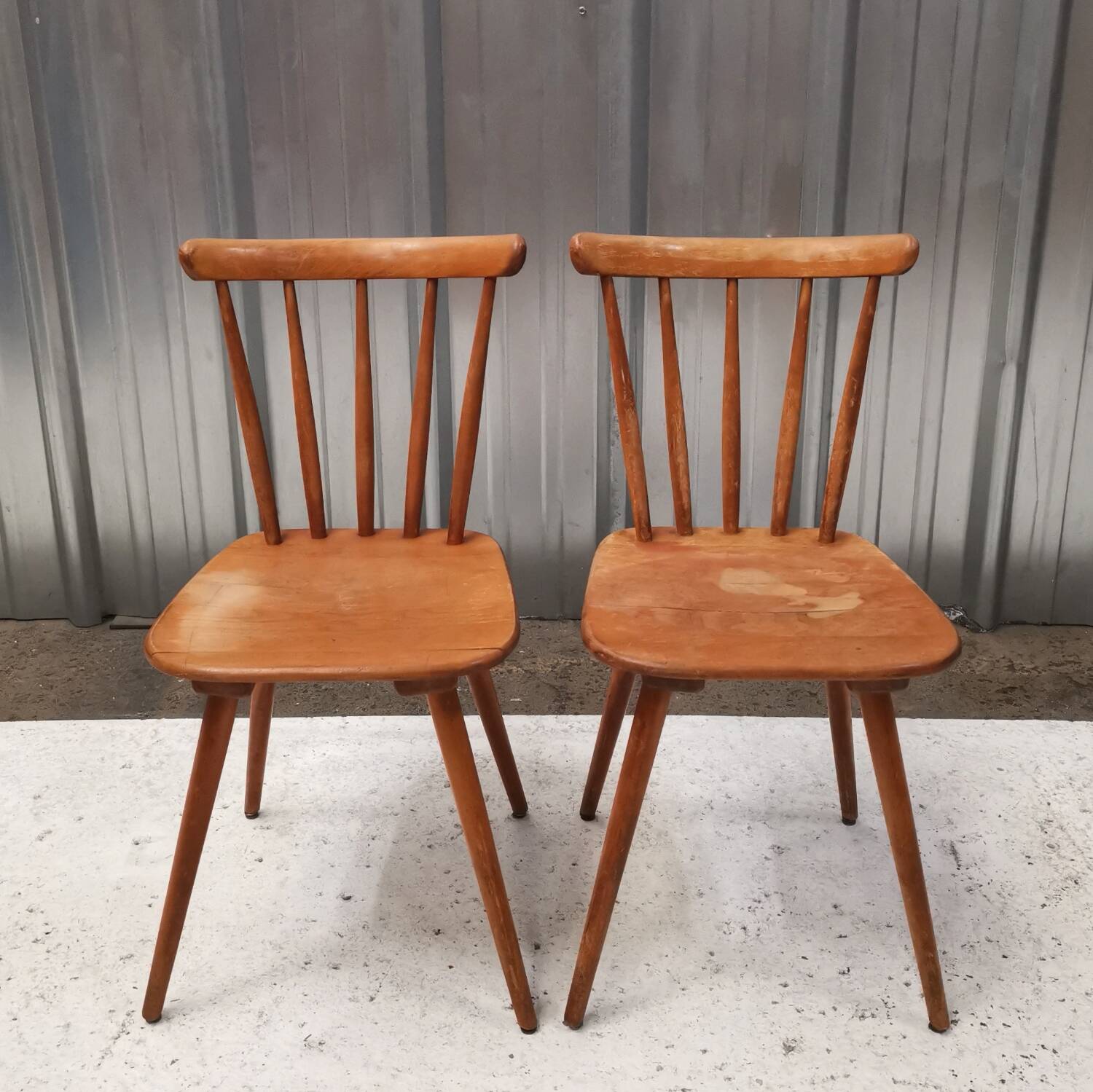 Pair of bistro chairs with bars