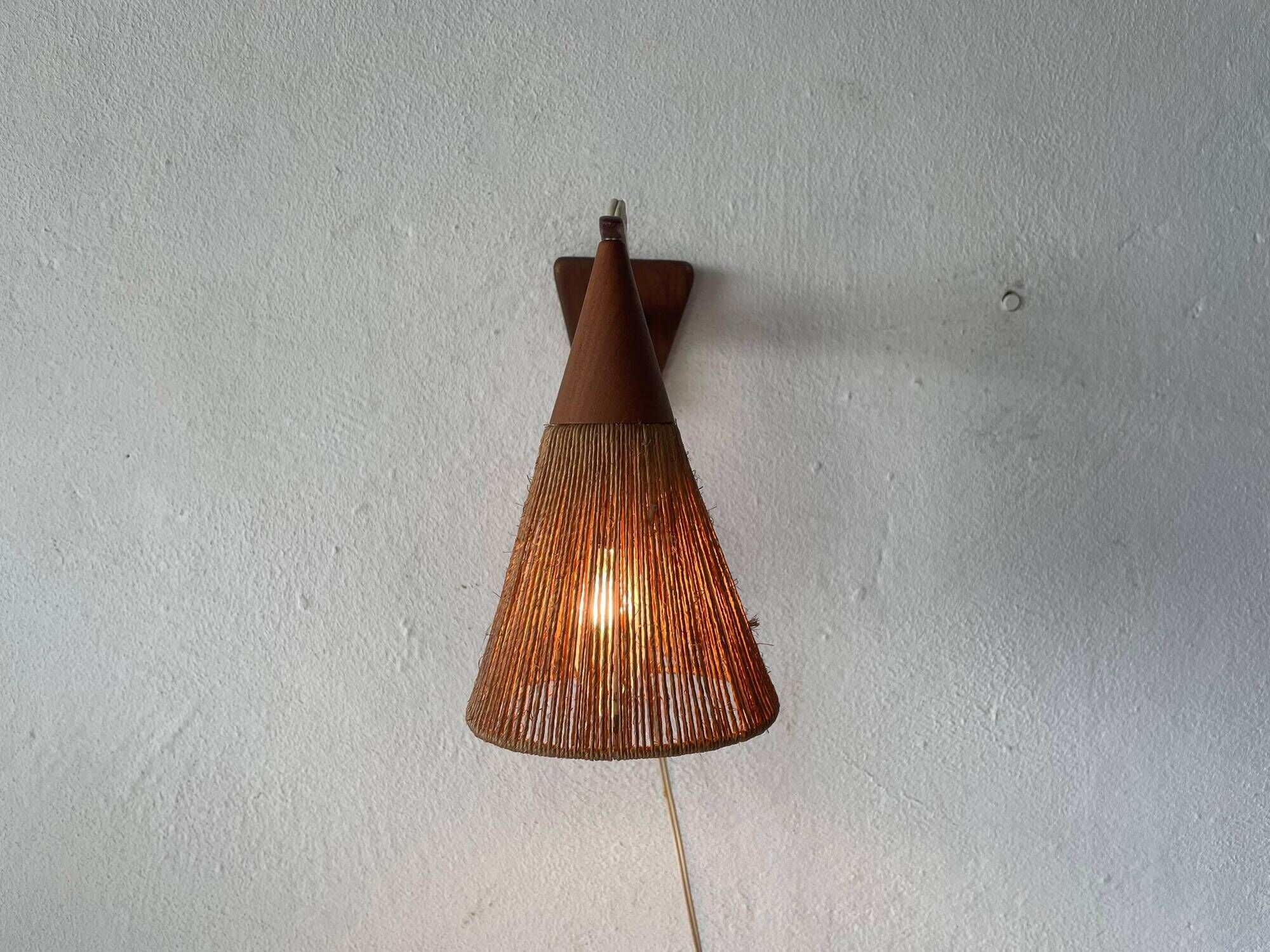 Teak wall lamp with natural ropes by Ib Fabiansen for Fog & Mørup, 1960s, Denmark.